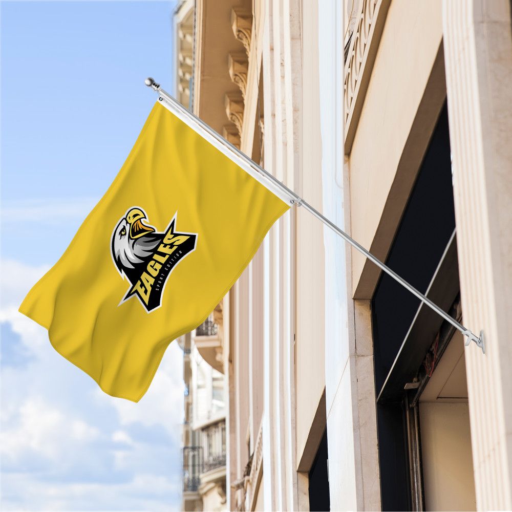 Custom flag on a wall-mounted pole outside a building