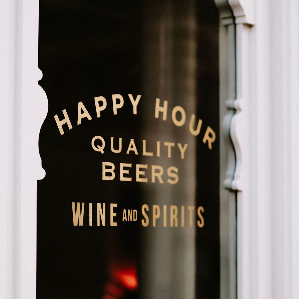 Gold cut vinyl lettering on a storefront window