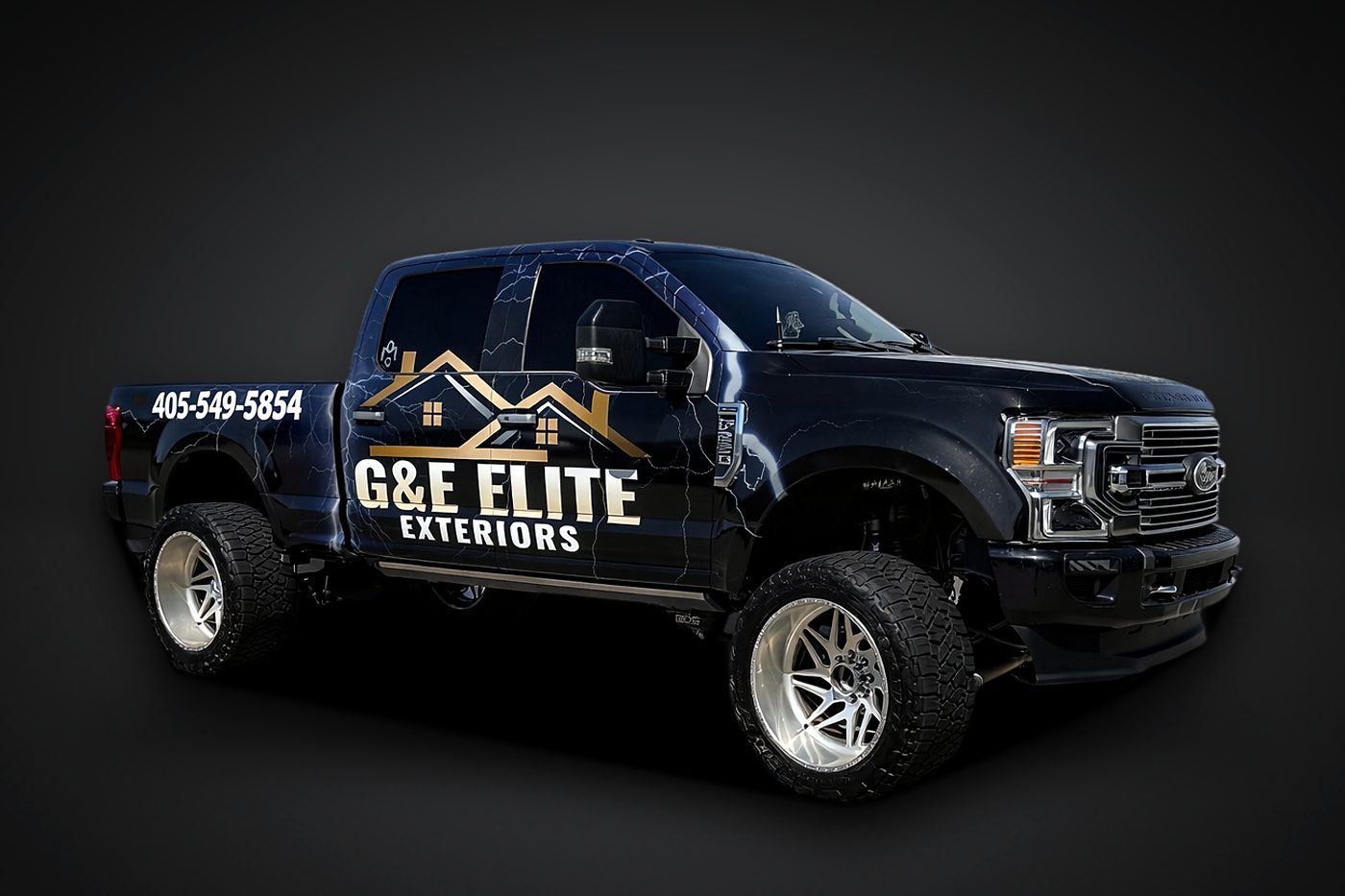 G&E Elite Exteriors full wrap on a lifted Ford Super Duty