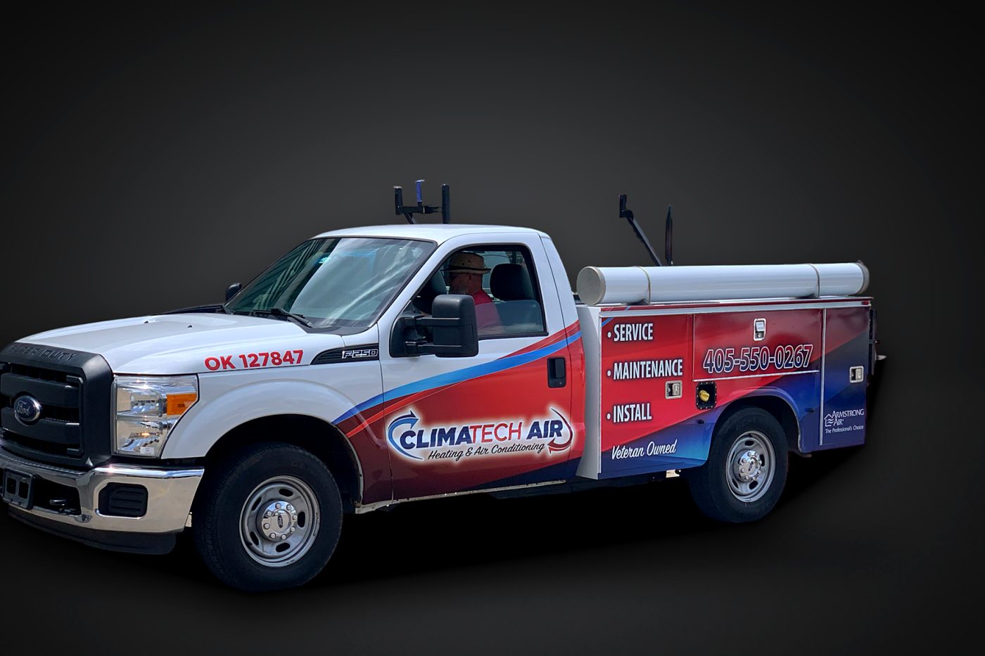Branded wrap on a Ford service truck with utility body