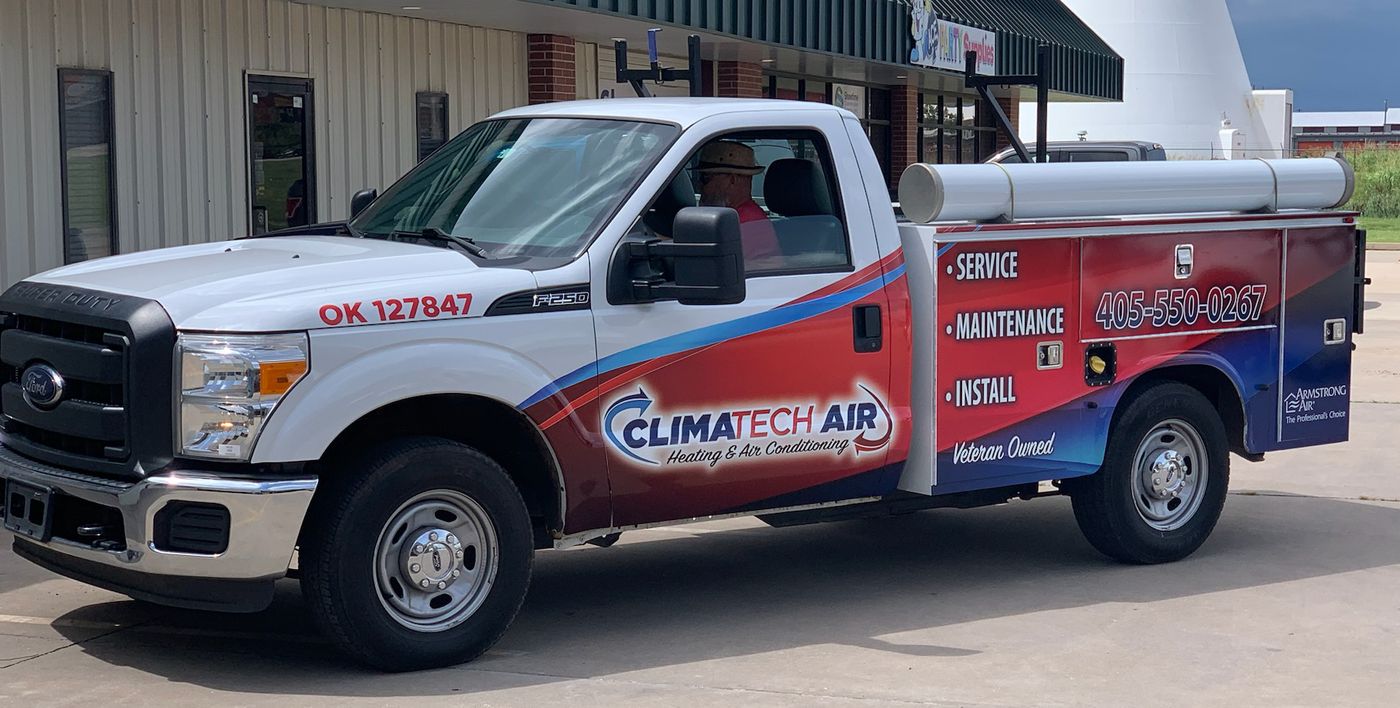 Branded wrap on a Ford service truck with utility body