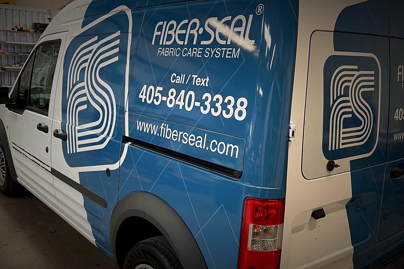 Fiber Seal wrap on a blue Ford Transit Connect van
