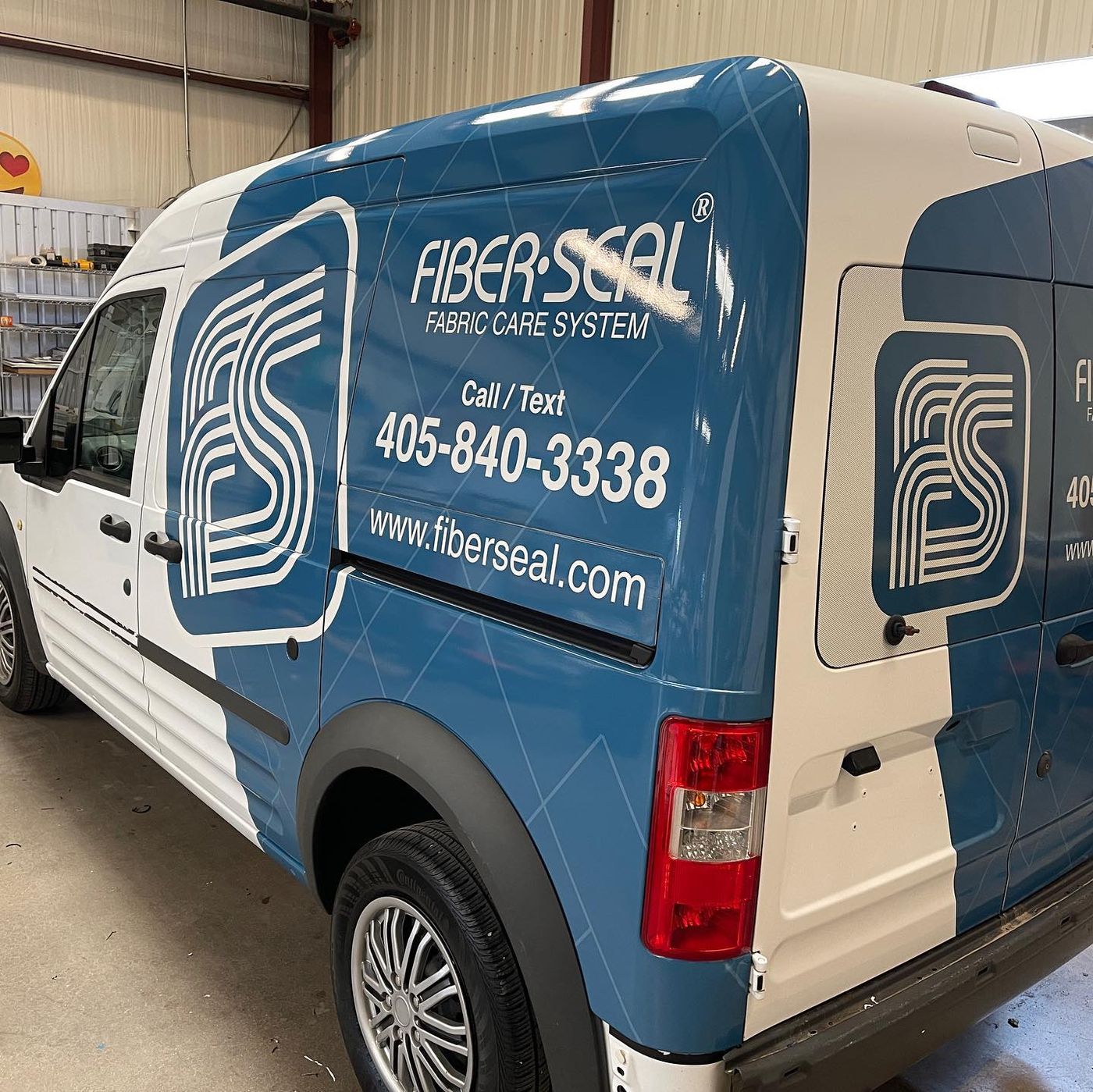Fiber Seal wrap on a blue Ford Transit Connect van