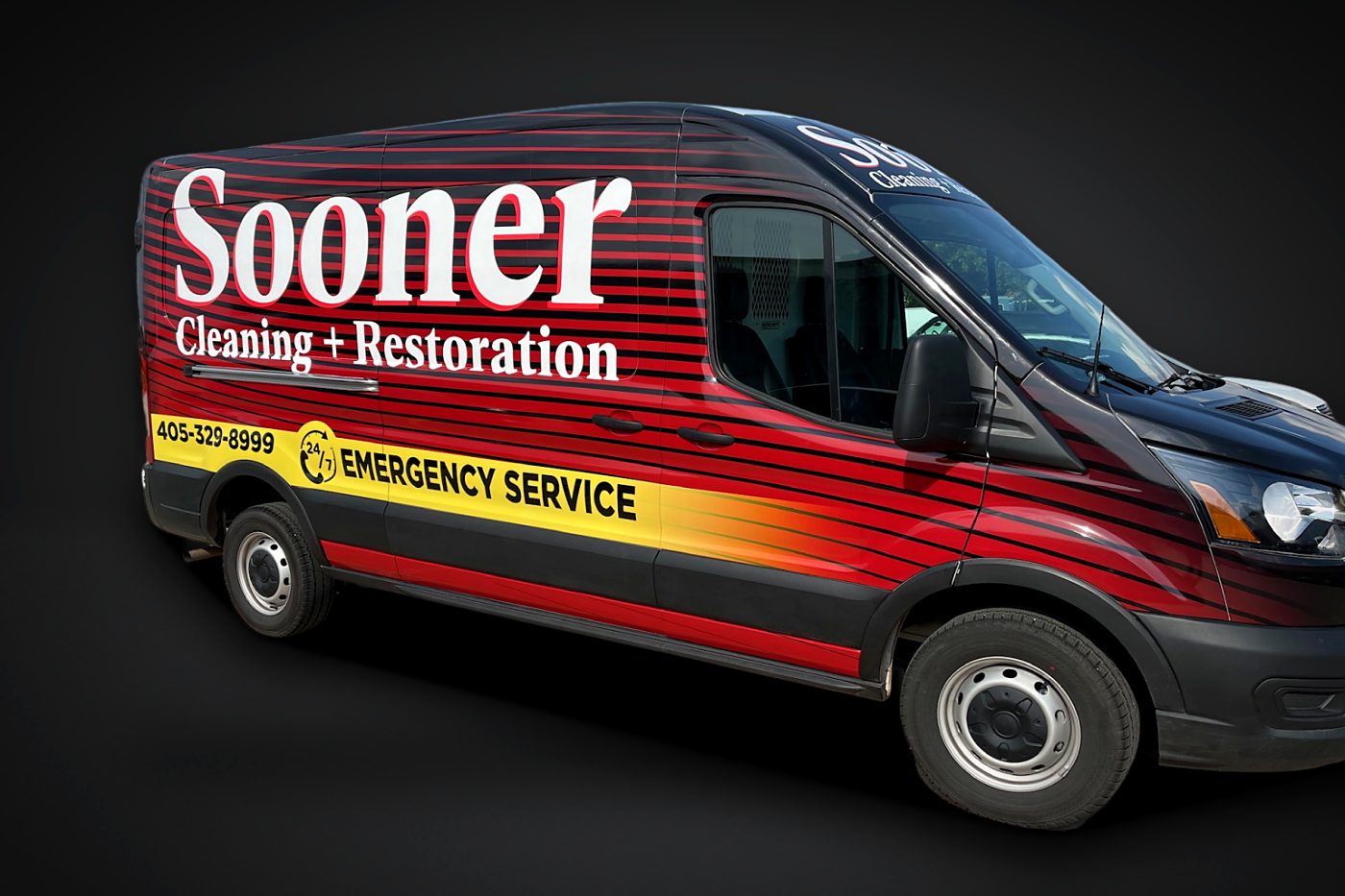 Sooner Cleaning + Restoration full wrap on a Ford Transit cargo van, side view