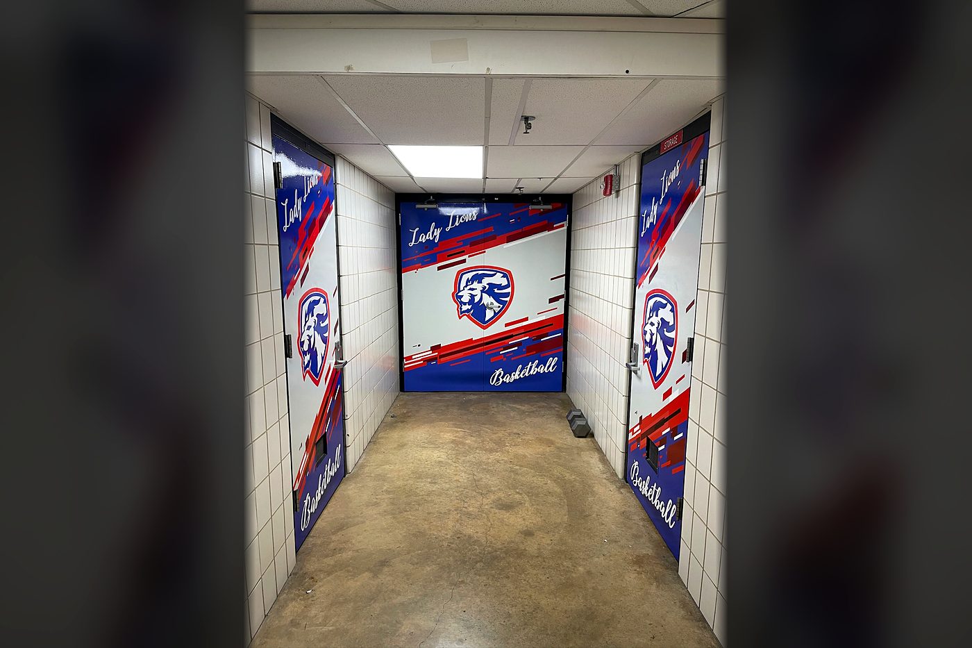 Moore High School Lions hallway wall wraps with lion end wall and side panels