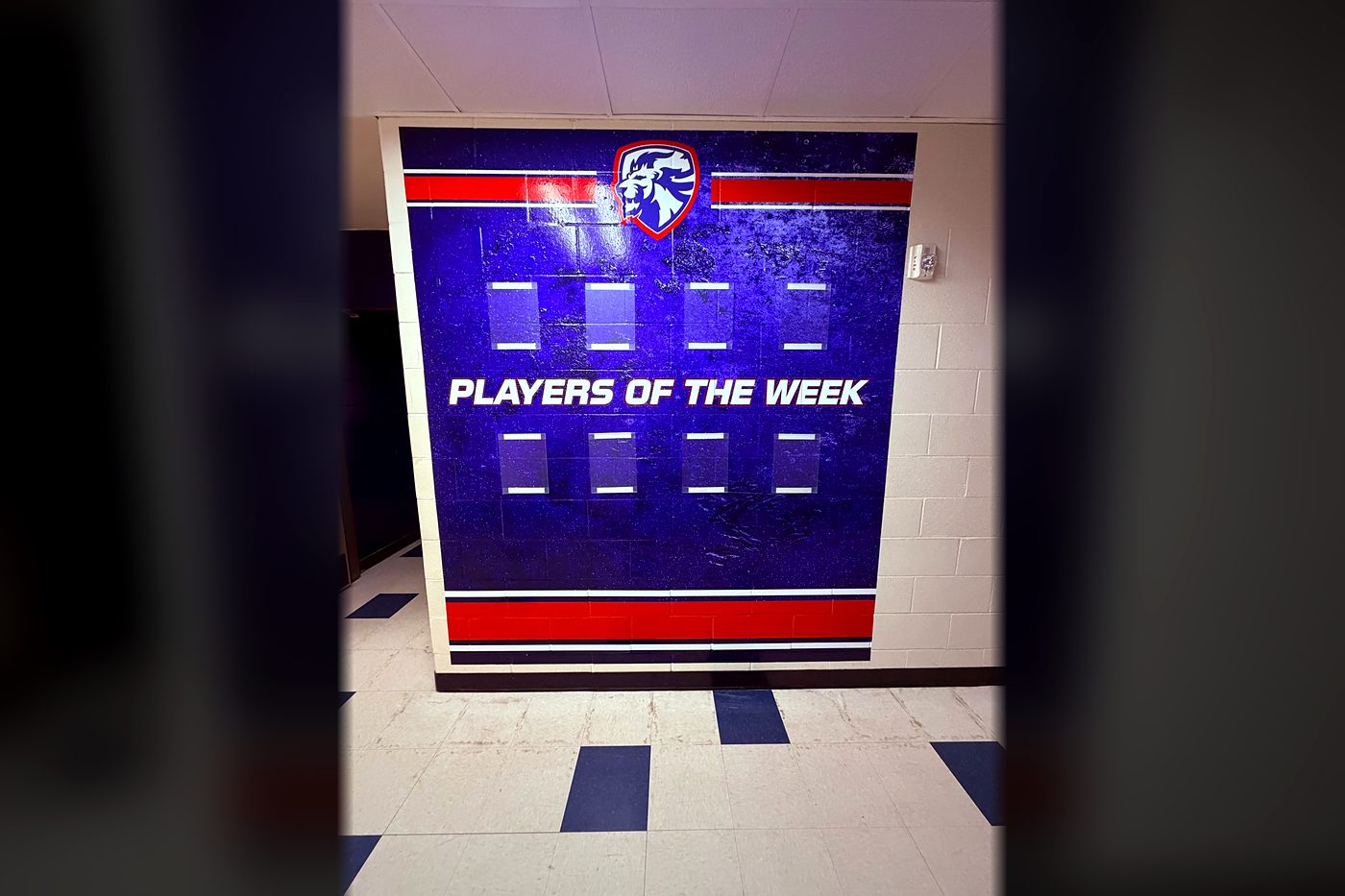 Moore High School Players of the Week wall board graphic