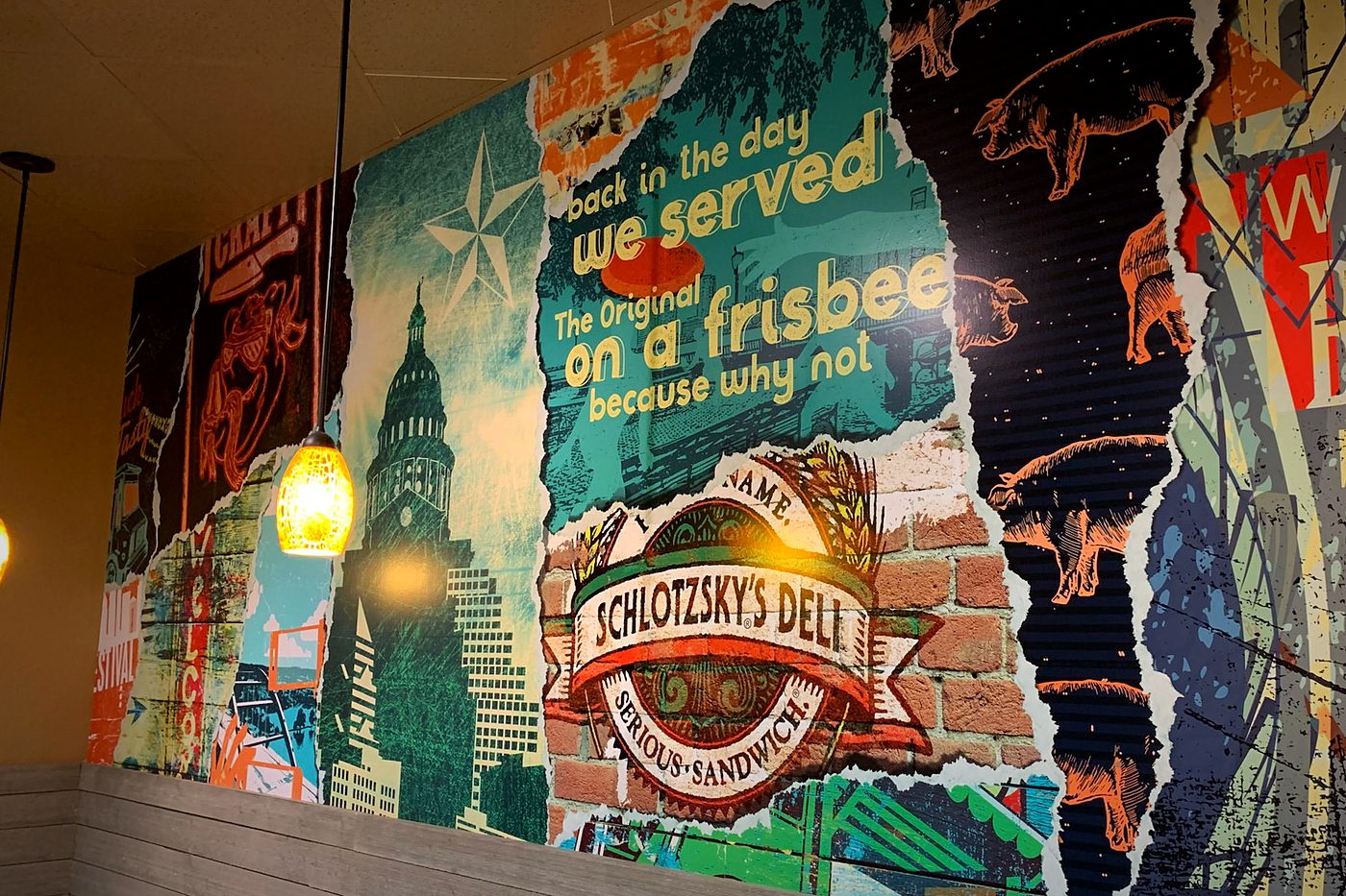 Schlotzsky's deli collage mural wall wrap in a restaurant dining room