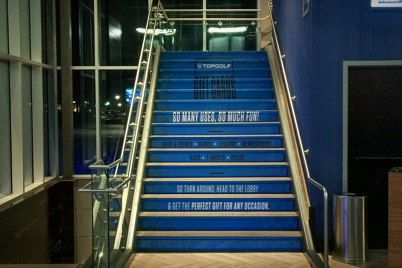 Topgolf stair riser graphics in the lobby stairway
