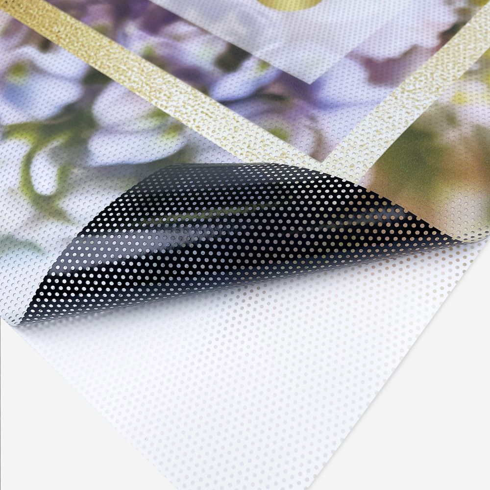 Close-up of window perf vinyl showing the perforations