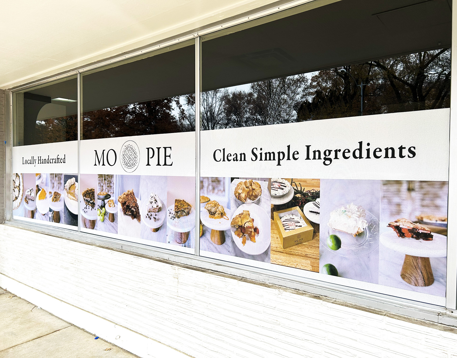 Retail storefront signage and promotional graphics