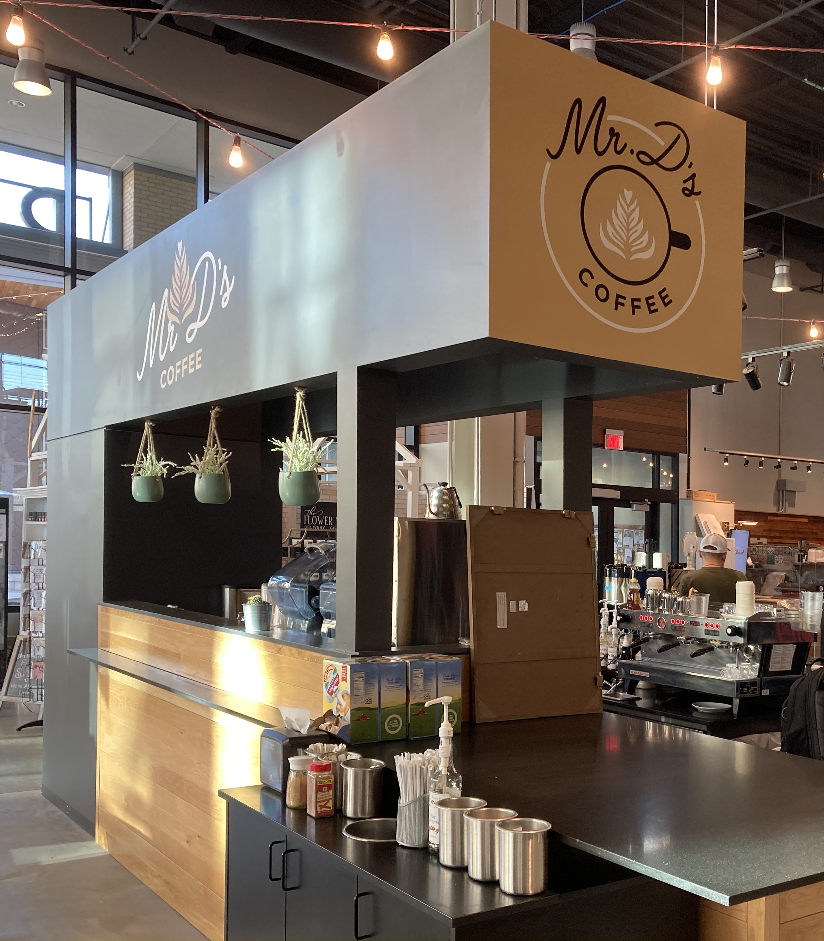 Custom wall decals installed at Mr. D's Coffee