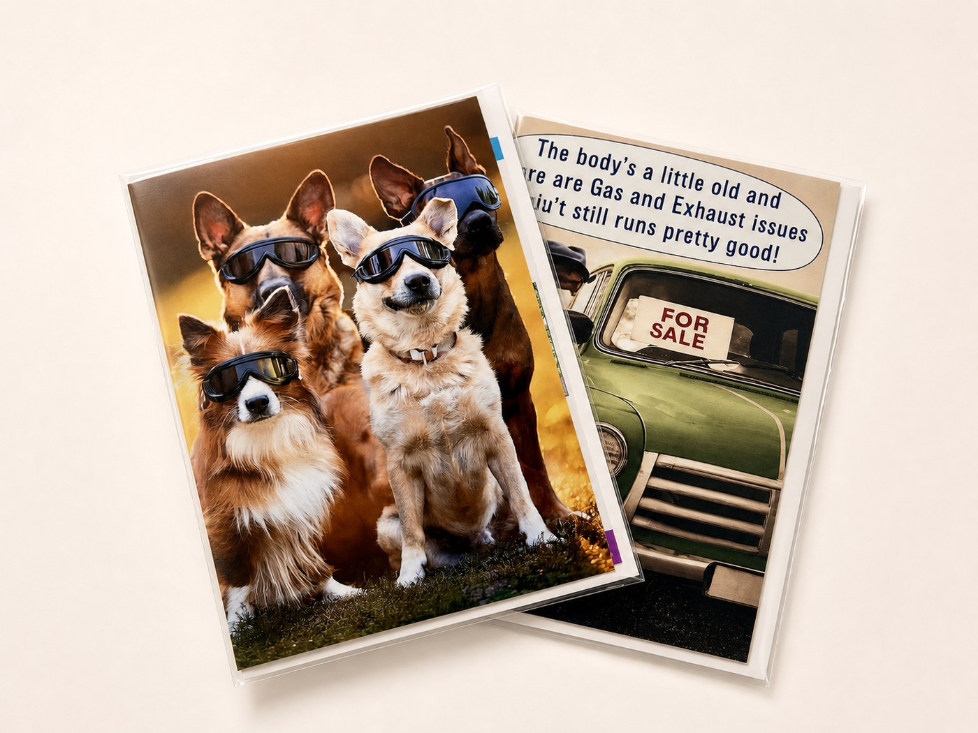 Humorous printed greeting cards featuring dogs and a vintage car