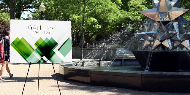 PolyAir Sign on an easel Outdoors